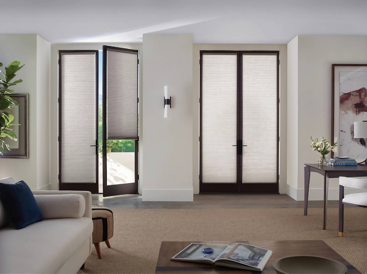 Hunter Douglas Duette® Cellular Shades on two sets of French doors in a chic living room at Designing Windows near Ocean City, MD